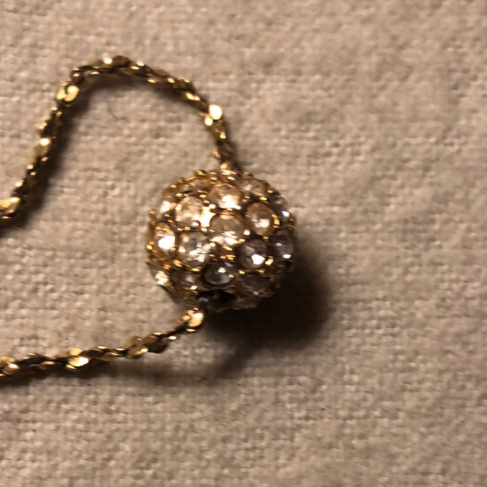 Vintage Lady Remington gold tone rhinestone ball necklace.